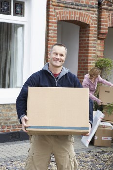 Removal team planning a move in Kingsbury street with boxes and van