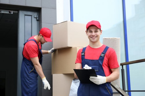 Man with a van team preparing a safe move with protective equipment